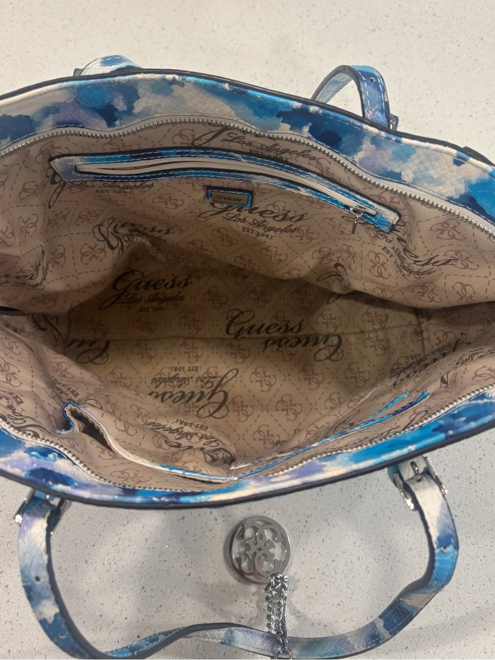 GUESS Blue & White Floral-Print Snakeskin-Textured Tote with Silver Charm
